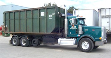 roll-off-container-on-truck-midwest-sanitation-and-recycling